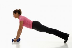 woman plank pushup weights